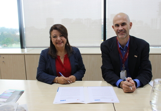 Durante la firma de la Carta de Coordinación entre UNFPA y Plan Internacional